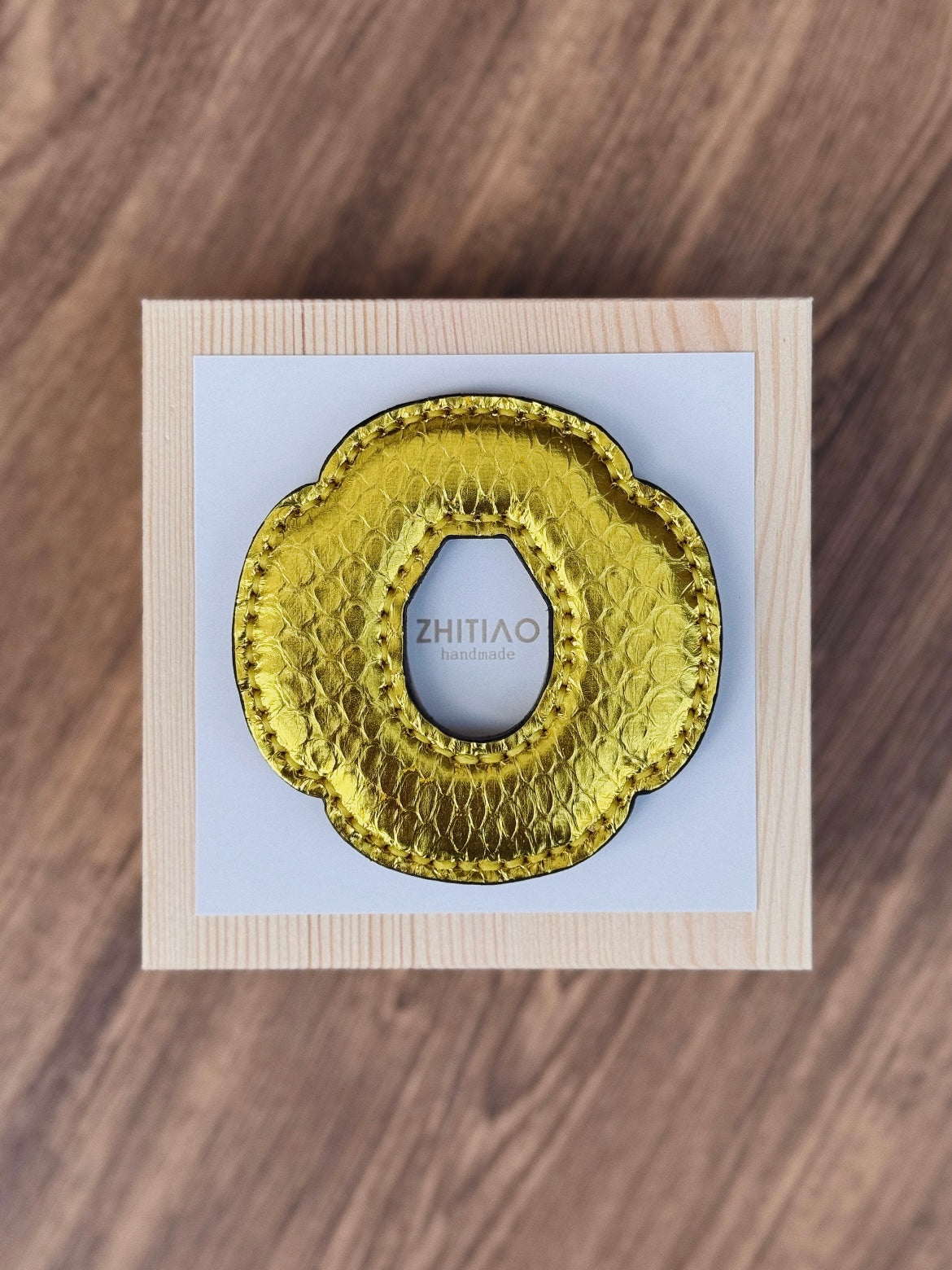 Kendo Tsuba for Bokuto | Python in gold